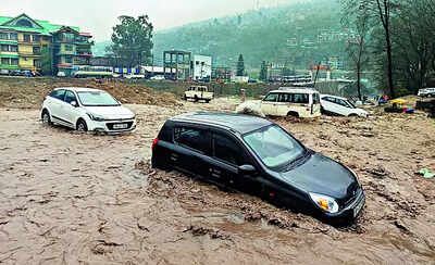 "Northeast India floods and landslides – Assam village submerged in water.