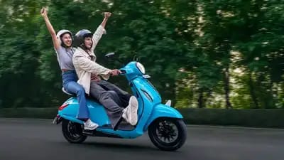 Chetak 3001 vs. TVS iQube: Chetak 3001 holds credibility with its blend of range, storage, styling, and smart tech under ₹1 lakh.