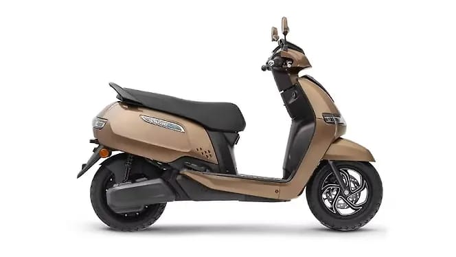 The all-new TVS iQube 3.1 kWh smart scooter with 121 km range, 82 kmph top speed at ₹1.05 Lakh. Features, Performance & FAQs.